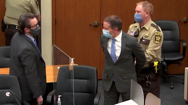 Former Minneapolis police officer Derek Chauvin is led away in handcuffs after being convicted of murdering George Floyd