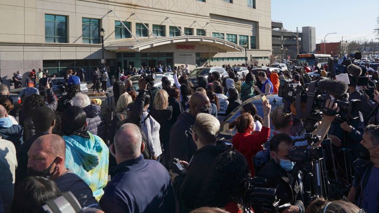 People attend a vigil for rapper DMX outside a hospital in White Plains, New York