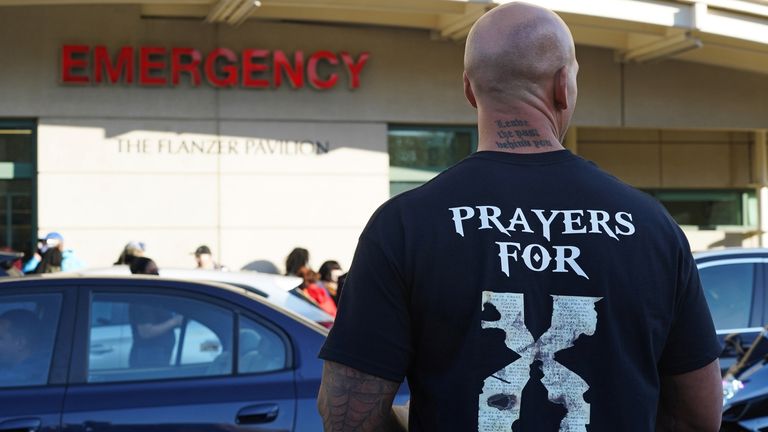 People attend a vigil for rapper DMX outside a hospital in White Plains, New York