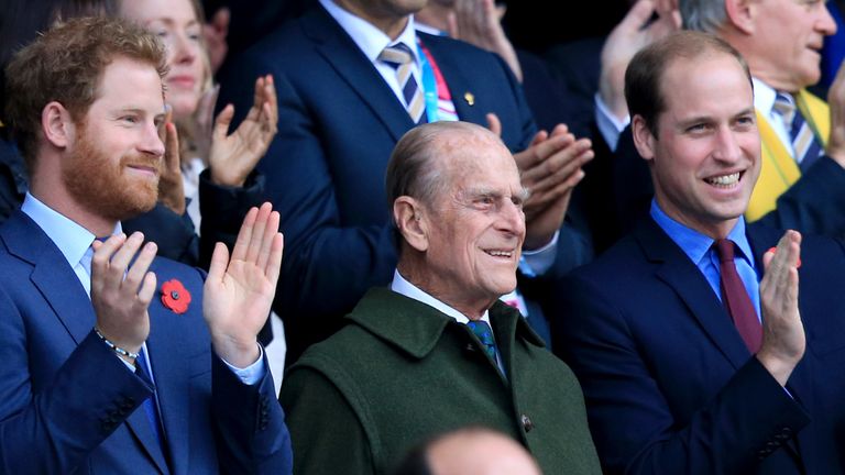 The Duke of Edinburgh with Prince William and Prince Harry at the Rugby World Cup final at Twickenham in 2015
