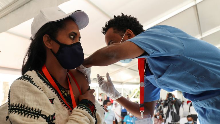 A woman receives a coronavirus vaccine under the COVAX scheme in Ethiopia 