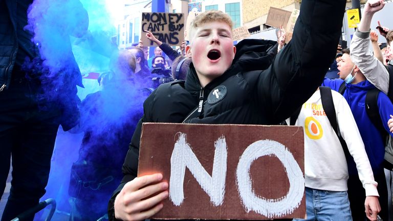 Fans outside Stamford Bridge protest against Chelsea&#39;s involvement in the planned European Super League