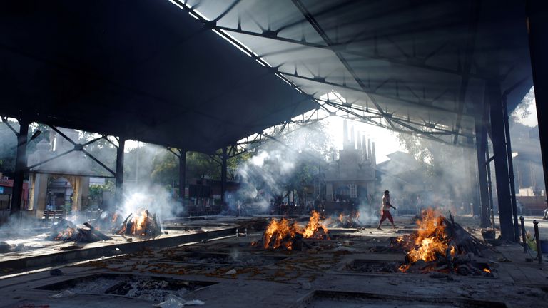 Funeral pyres at a crematorium in Delhi