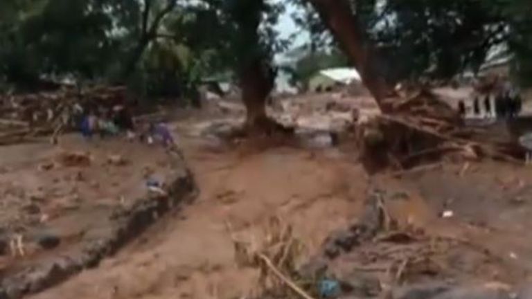 Raging floods sweep through Indonesian island of Flores
