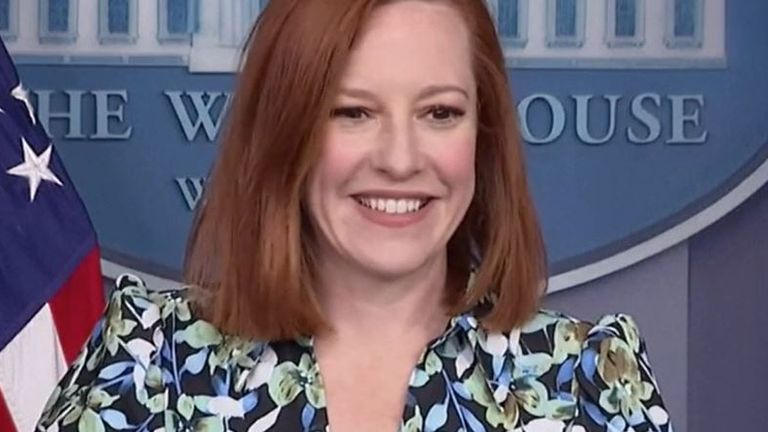 Jen Psaki pauses during White House press briefing as commemorative flyover drowns out sound