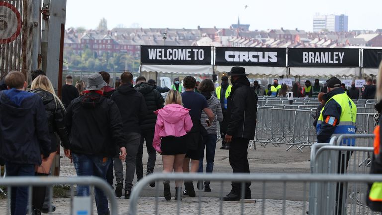 Revellers arrive at Circus nightclub in Bramley-Moore Dock, Liverpool