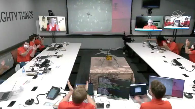 The team at NASA&#39;s Jet Propulsion Laboratory (JPL) react after the Mars helicopter Ingenuity&#39;s first flight