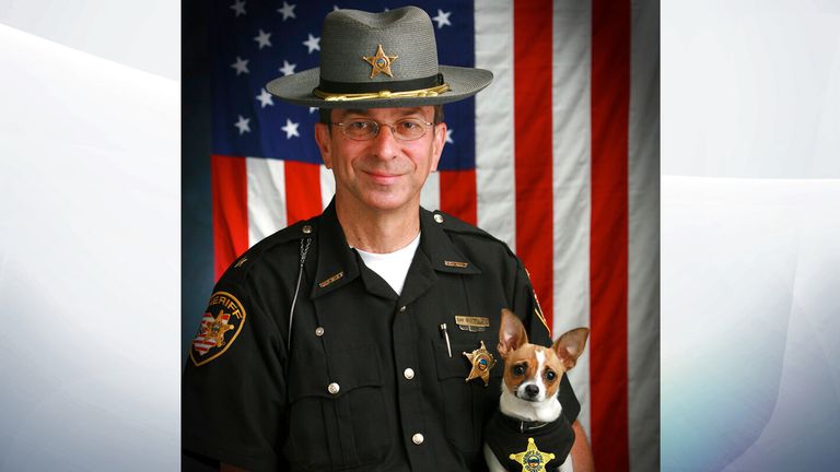 Midge was certified the smallest police dog in the world. Pic: John Hoffart/AP