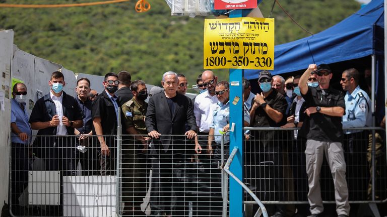 Israeli Prime Minister Benjamin Netanyahu visits the scene of the tragedy. Pic: AP
