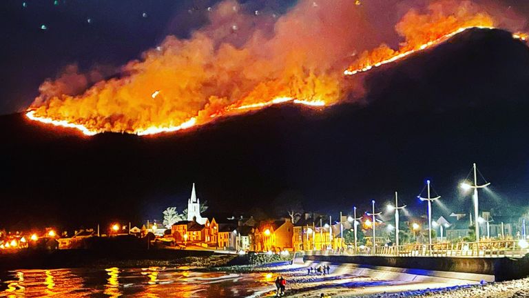 A huge gorse fire spreading across the Mourne Mountains in Co Down, as seen from Newcastle