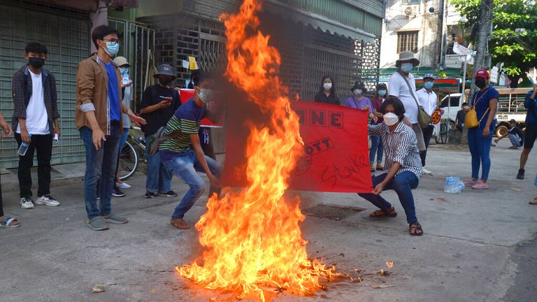 Anti-coup protesters burned a Chinese flag in Yangon on Wednesday. Pic: AP