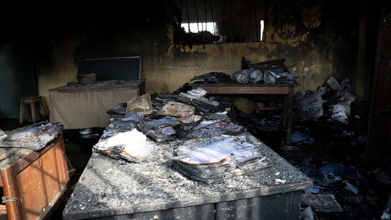 Burnt prison books are seen on the table after gunmen attacked and set the prison facility ablaze in Imo State