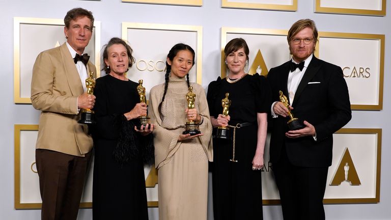 Nomadland producers Peter Spears, Frances McDormand, Chloe Zhao, Mollye Asher and Dan Janvey, winners of the Oscar for best picture. Pic: AP

