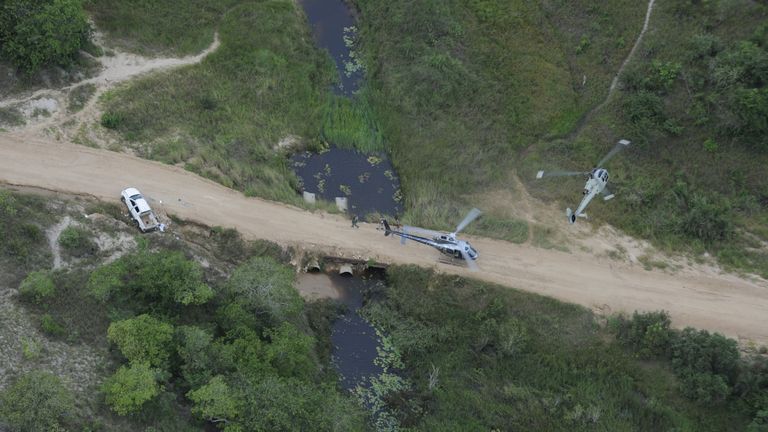Helicopters search for survivors after the attack on the Amarula hotel