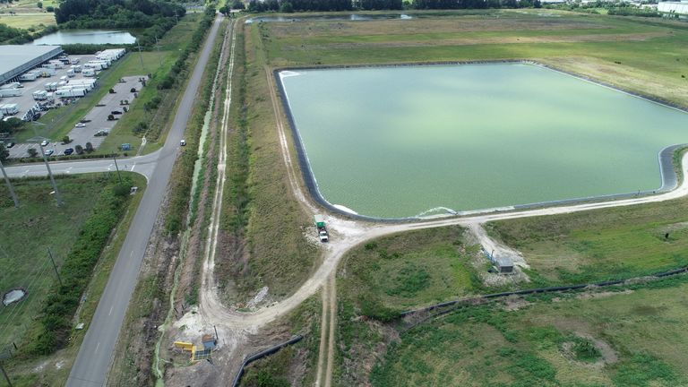 A reservoir of a defunct phosphate plant south of Tampa, where a leak at a waste water reservoir forced the evacuation of hundreds of homes and threatened to flood the area and Tampa Bay with polluted water, is seen in an aerial photograph taken in Piney Point, Florida, U.S. April 4, 2021.
