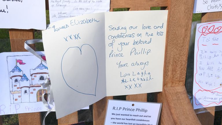 Some of the tributes left outside Buckingham Palace 