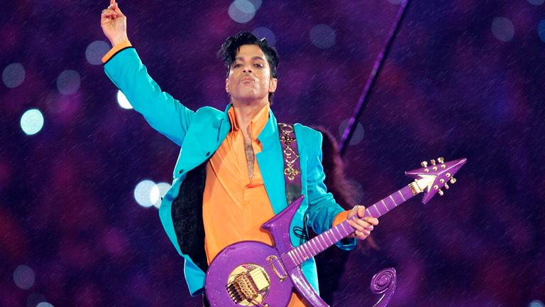 FILE - In this Feb. 4, 2007, file photo, Prince performs during the halftime show at the Super Bowl XLI football game in Miami. The music icon died of an accidental opioid overdose at his Paisley Park studio on April 21, 2016. (AP Photo/Chris O&#39;Meara, File)