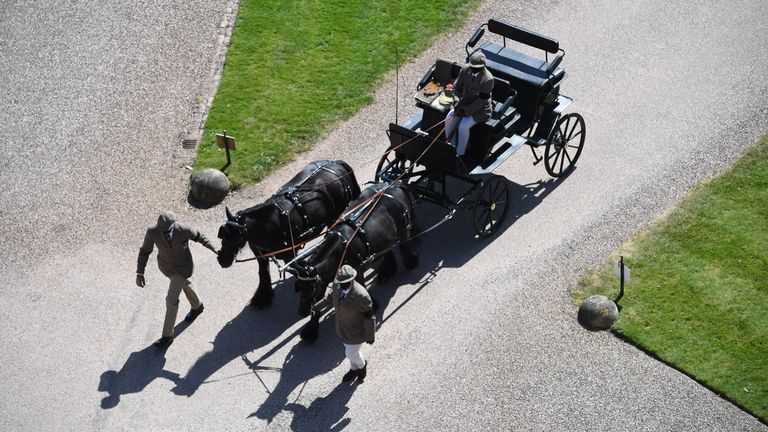 Fell ponies, Balmoral Nevis and Notlaw Storm pullling the Duke of Edinburgh&#39;s driving carriage arrive for the funeral of the Duke in Windsor Castle, Berkshire. Picture date: Saturday April 17, 2021.