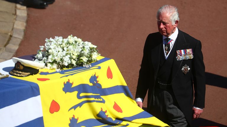 The Prince of Wales walks behind The Duke of Edinburgh’s coffin, covered with His Royal Highness’s Personal Standard, outside St George&#39;s Chapel, Windsor Castle, Berkshire, before the funeral of the Duke of Edinburgh. Picture date: Saturday April 17, 2021.