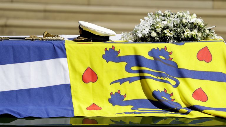 The Duke of Edinburgh&#39;s coffin, covered with His Royal Highness&#39;s Personal Standard on The Land Rover Defender outside St George&#39;s Chapel, Windsor Castle, Berkshire, during the funeral of the Duke of Edinburgh. Picture date: Saturday April 17, 2021.