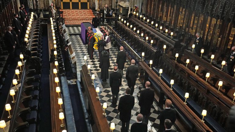 Members of the royal family follow the coffin into St George&#39;s Chapel during the funeral of the Duke of Edinburgh, at Windsor Castle, Berkshire. Picture date: Saturday April 17, 2021.