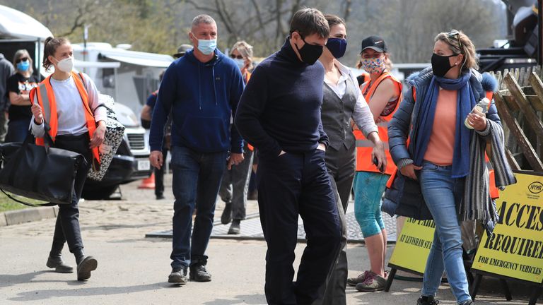 Tom Cruise walking on set 