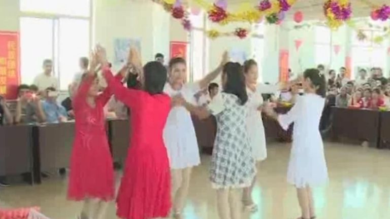 Uighurs in Shandong shown dancing on Chinese state media celebrating the festival of Eid-al-Adha