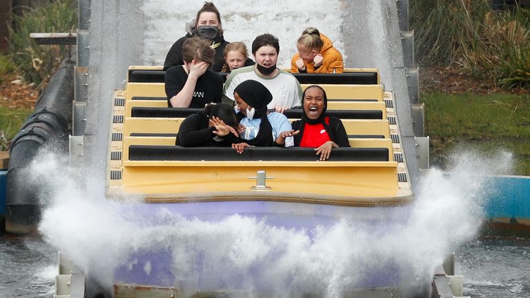 People react while on a ride as Thorpe Park reopens following easing of the coronavirus disease (COVID-19) restrictions, in London, Britain April 12, 2021. REUTERS/Matthew Childs