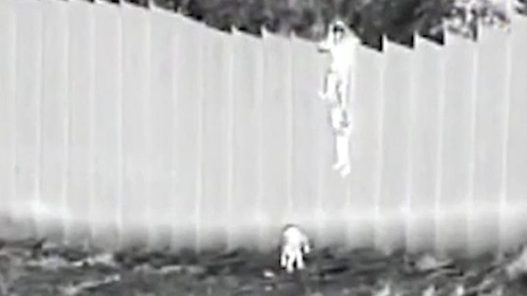 Two children are dropped over the US-Mexico border wall 