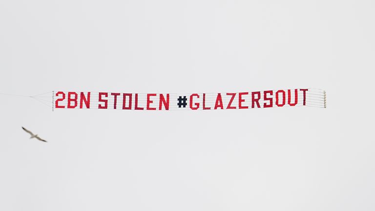Manchester United fans fly anti-Glazer banner over Elland Road