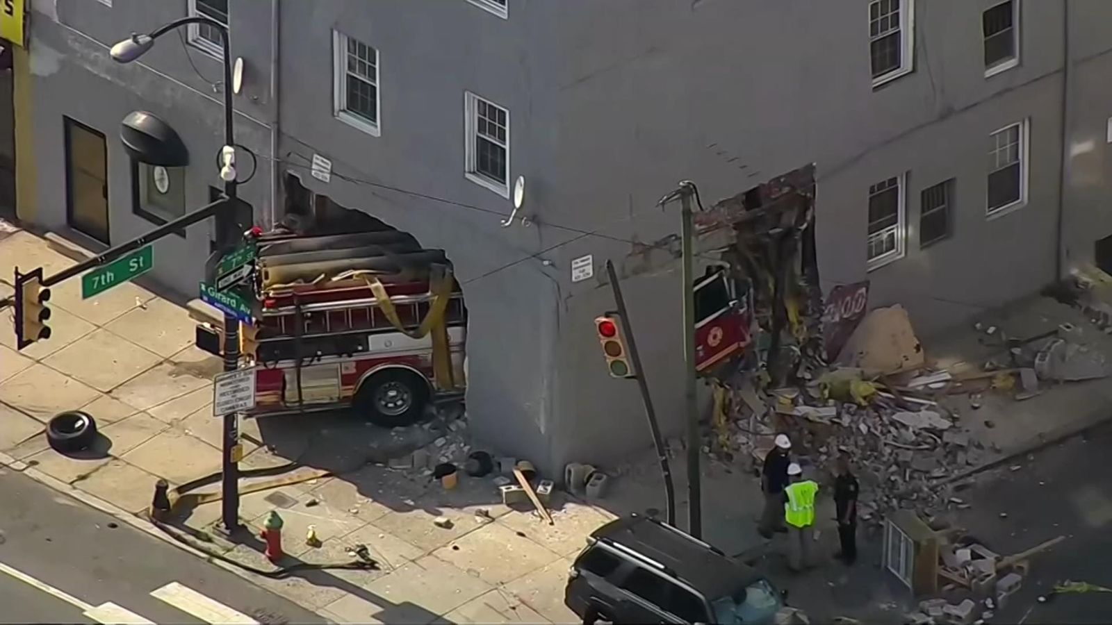 Five hurt as fire engine crashes through building in Philadelphia | US ...