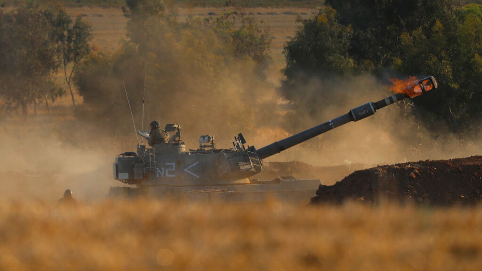 Israel assembles troops at Gaza border as international flights ...