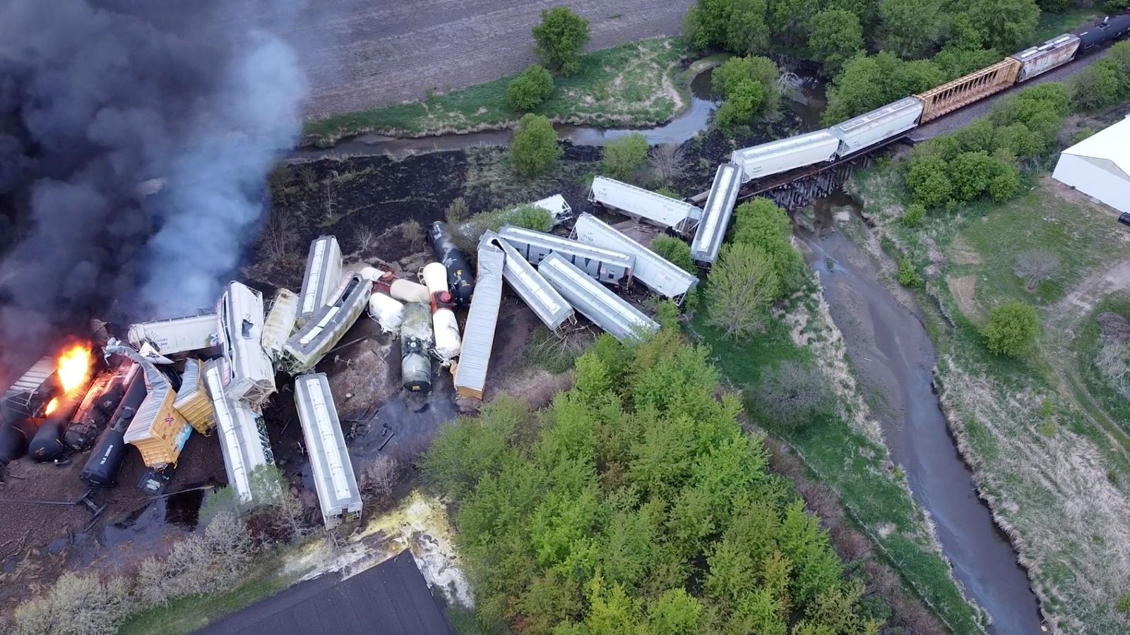 Freight train carrying hazardous substances derails and catches fire in