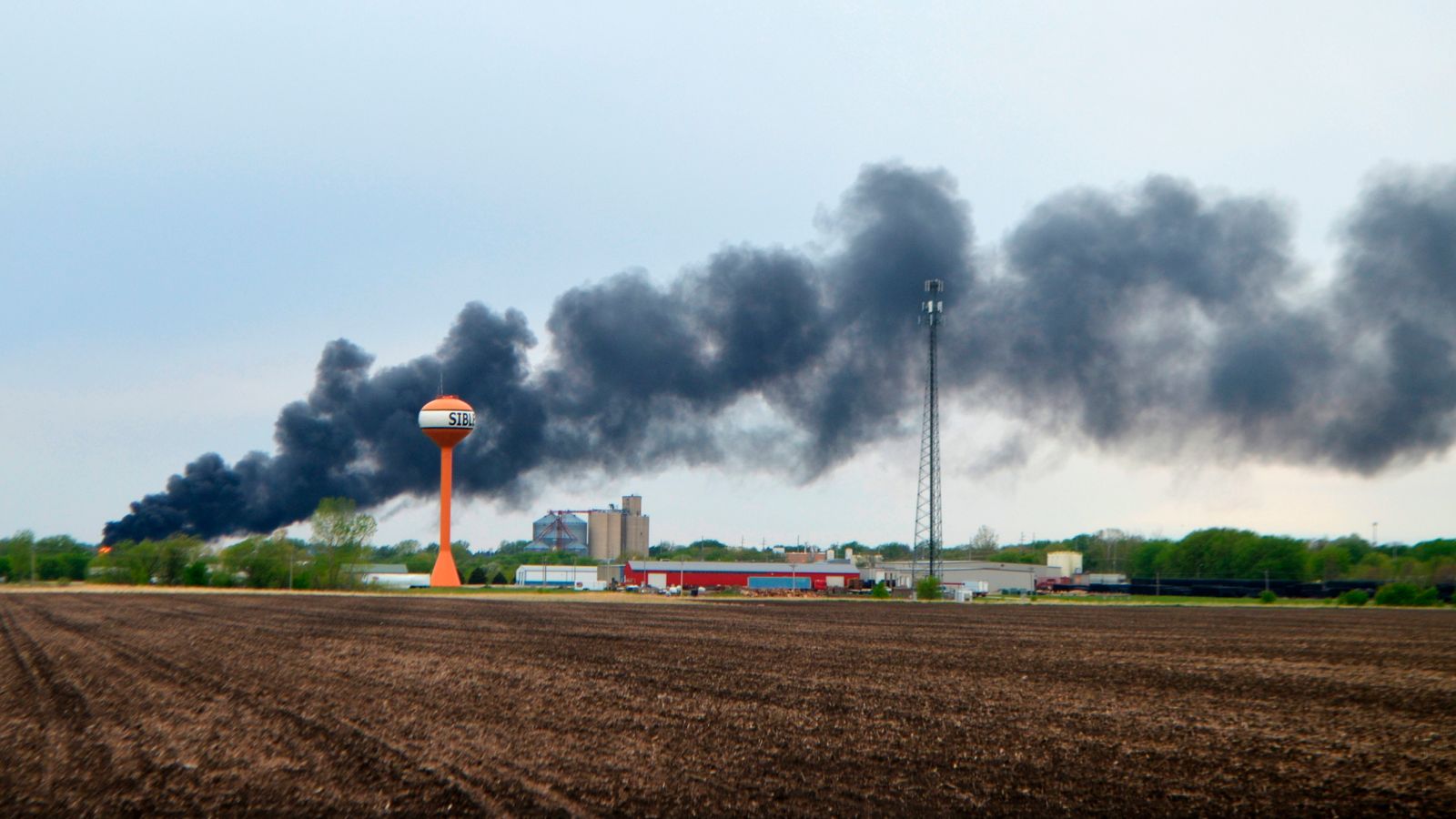 Iowa freight train carrying hazardous substances derails and catches