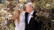 Boris Johnson and Carrie Johnson in the garden of 10 Downing Street after their wedding on Saturday.