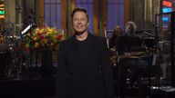 Elon Musk smiles as the audience laugh at his jokes as he hosts Saturday Night Live. Pic:NBC/YouTube