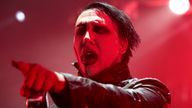 FILE - In this Aug. 2, 2015, file photo, Marilyn Manson performs in concert in Camden, N.J. Detectives are investigating Manson for allegations of domestic violence that reportedly occurred about a decade ago in West Hollywood, authorities said. The domestic violence is believed to have occurred between 2009 and 2011, when Manson lived in the city of West Hollywood. (Photo by Owen Sweeney/Invision/AP, File)