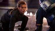 This image released by Disney shows Scarlett Johansson in a scene from "Black Widow." (Jay Maidment/Disney-Marvel via AP)