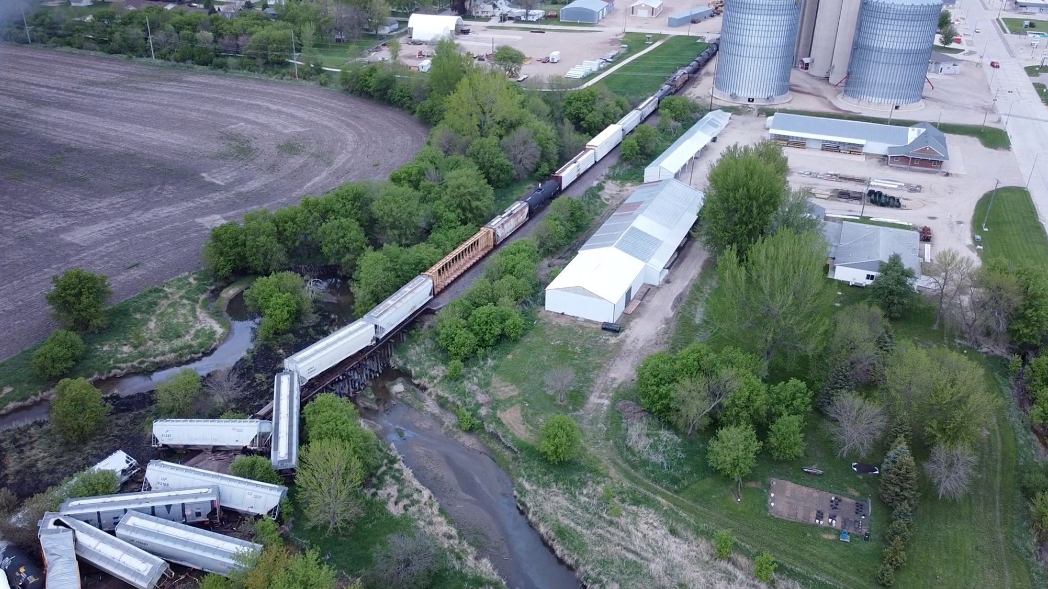 Iowa freight train carrying hazardous substances derails and catches