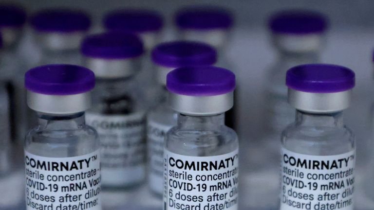 FILE PHOTO: Vials of the Pfizer-BioNTech Comirnaty coronavirus disease (COVID-19) vaccine are pictured in a General practitioners practice in Berlin, Germany, April 10, 2021. REUTERS/Fabrizio Bensch/File Photo
