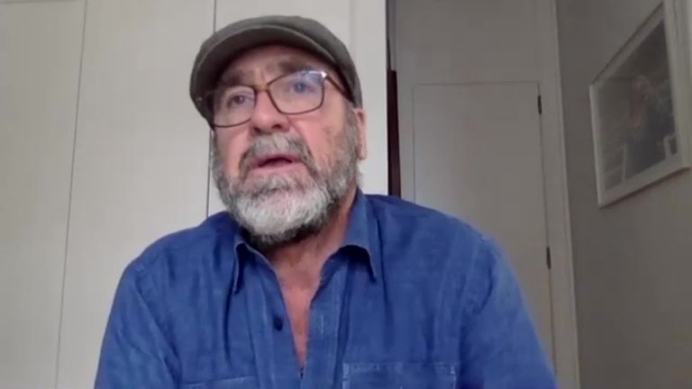 A trawler? Passing boat grabs Cantona's attention mid-answer
