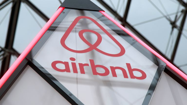 FILE PHOTO: The Airbnb logo is seen on a little mini pyramid under the glass Pyramid of the Louvre museum in Paris, France, March 12, 2019