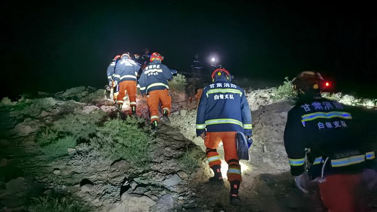 China Gansu Jingtai Marathon Extreme Weather - 23 May 2021. Rescuers search for missing people at the Yellow River Stone Forest tourist site in Jingtai County of Baiyin City, northwest China's Gansu Province, May 23, 2021