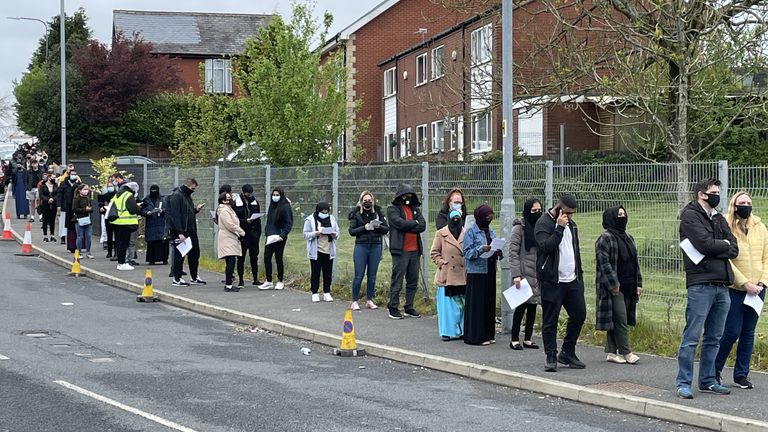 People queue for vaccines in Bolton where cases of the Indian variant have spread rapidly