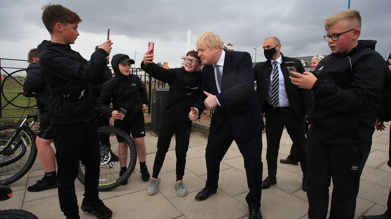 Boris Johnson poses for a &#39;selfie&#39; as he meets members of the public while campaigning on behalf of Conservative candidate Jill Mortimer in Hartlepool