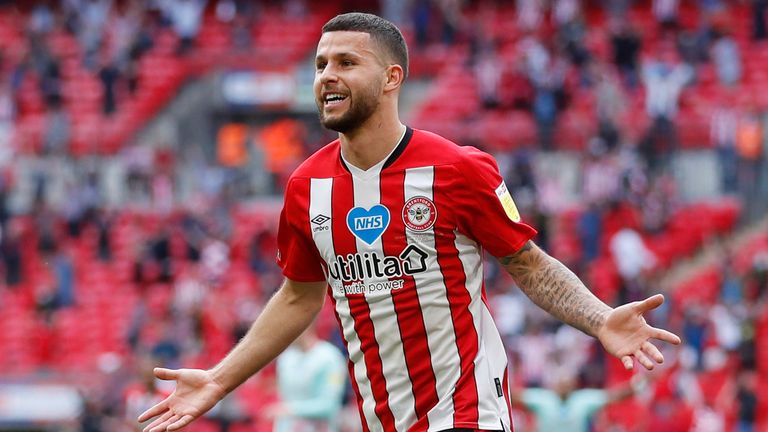 Emiliano Marcondes celebrates putting Brentford 2-0 up