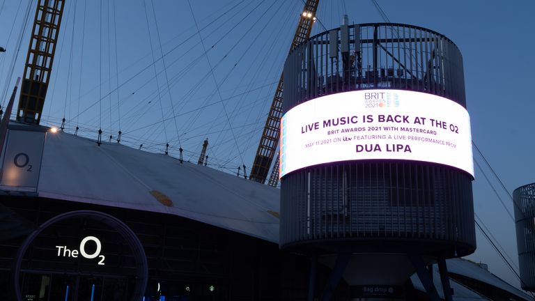 A billboard outside the O2 shows Dua Lipa will be performing at the Brit Awards
