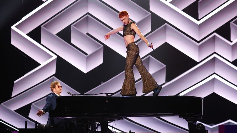 Years And Years frontman Olly Alexander and Sir Elton John performing at the Brits