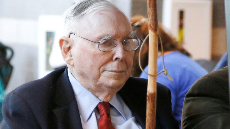 Berkshire Hathaway vice chairman Charlie Munger visits the shareholder shopping day in a golf cart as part of the Berkshire Hathaway annual meeting weekend in Omaha, Nebraska, May 5, 2017