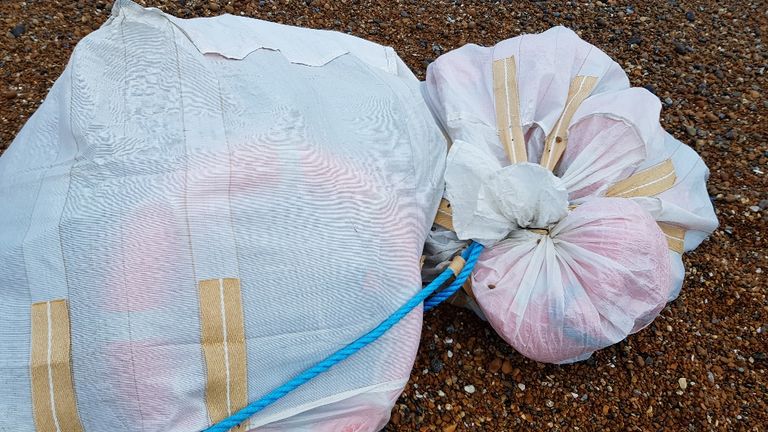 Passers-by on a beach near Hastings discovered large bags containing a tonne of cocaine. Pic: NCA